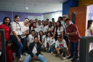 Group photo taken at the office, during the blessing of the new office